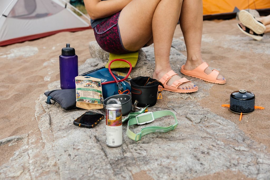 Hungry Hiker dehydrated meal and hiking gear at a campsite